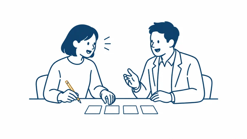 デザイナーと社長がテーブルでカードをならべ、話を整理する絵